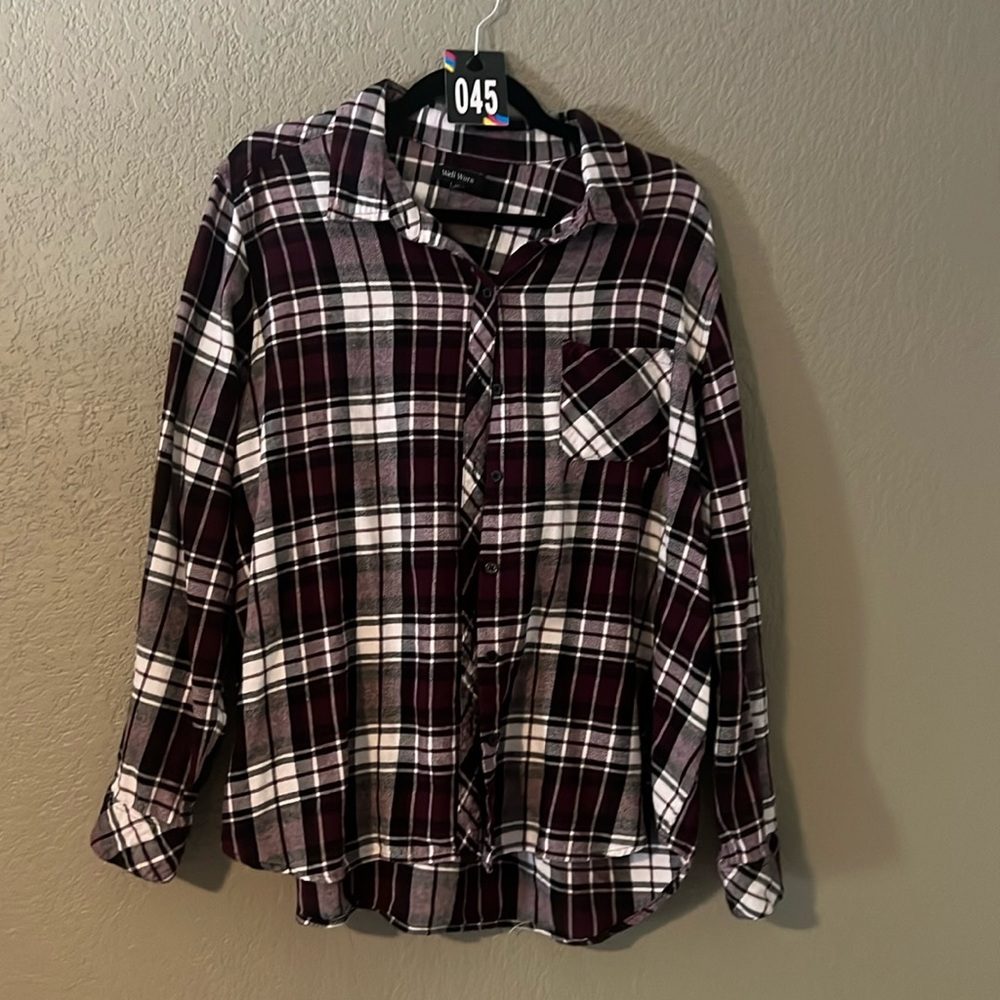 45 purple, black, and white plaid flannel